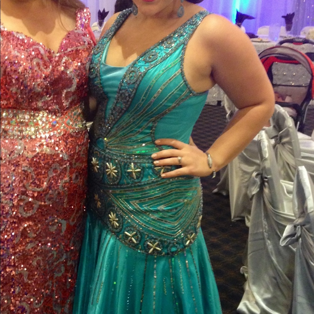 Original Lebanese dress in teal with multicolor.